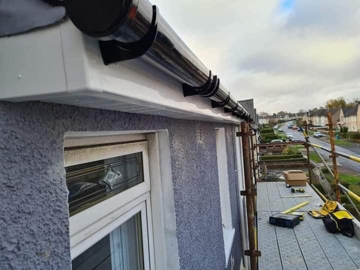 New black guttering and clean white roofline