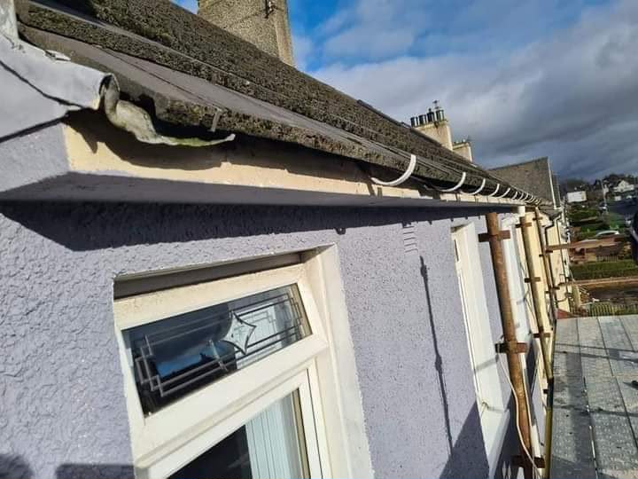 Old damaged guttering before replacement