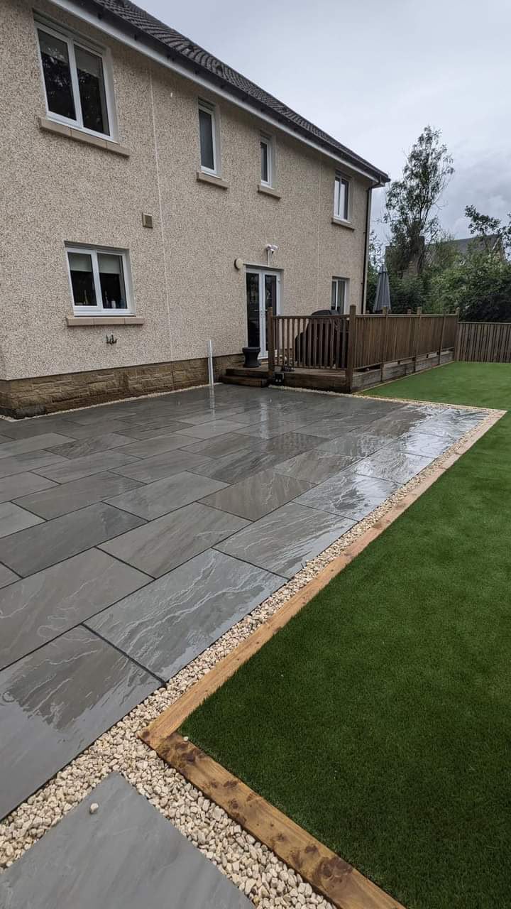 Completed paved patio and artificial lawn by Home Repair Scotland