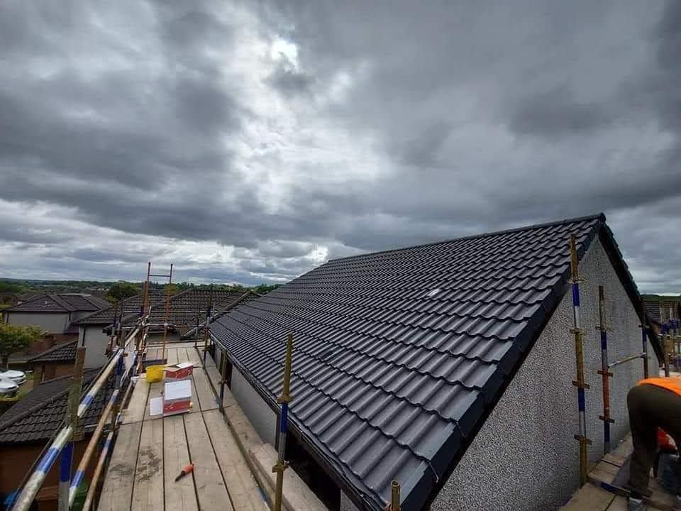 Newly completed tiled roof by Home Repair Scotland